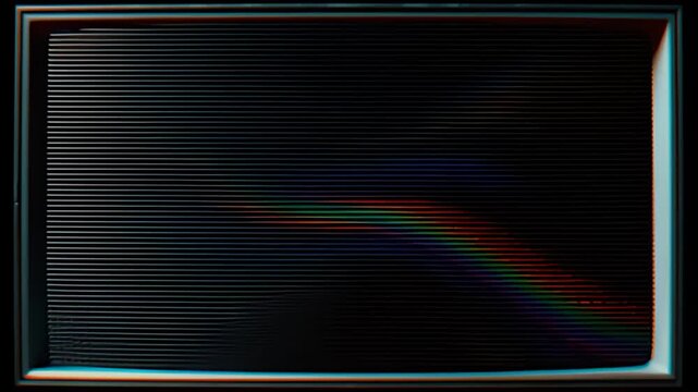 Shifting digital rainbow glitch effect on a monitor screen