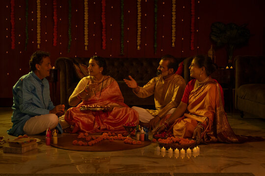 Family conversing during Diwali celebration