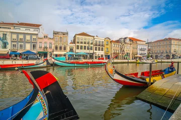 Traditional moliceiro boats moored on the central canal of Aveiro, Portugal © f11photo