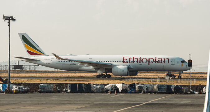 Addis Ababa, Ethiopia - May 28, 2026: Ethiopian Airlines plane on the runway at Addis Ababa airport during daytime