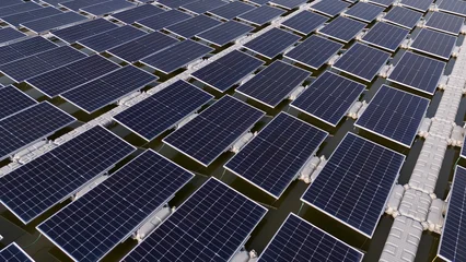 Power panels for green energy. Floating solar panels or solar cell Platform system on the lake. Floating solar panels or solar cell Platform on the water. Alternative renewable energy. © eakarat