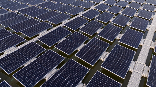 Power panels for green energy. Floating solar panels or solar cell Platform system on the lake. Floating solar panels or solar cell Platform on the water. Alternative renewable energy.