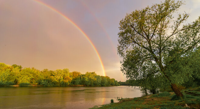 spring rainbow over the river