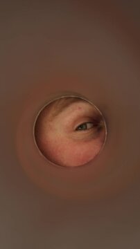 Vertical screen person keeps eating potato chips from a snack tube showing overeating loss of control food cravings emotional eating and unhealthy snacking habits