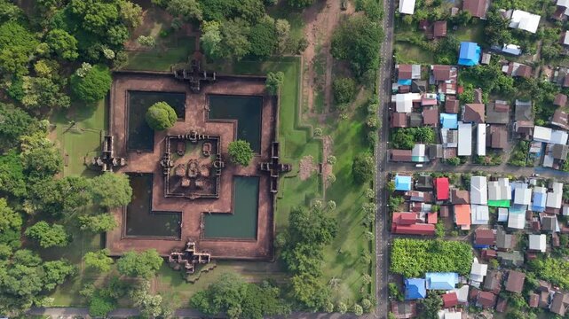 Aerial drone view of the 10th-century Prasat Muang Tam Khmer temple ruins in Thailand, captured empty during a serene morning sunrise