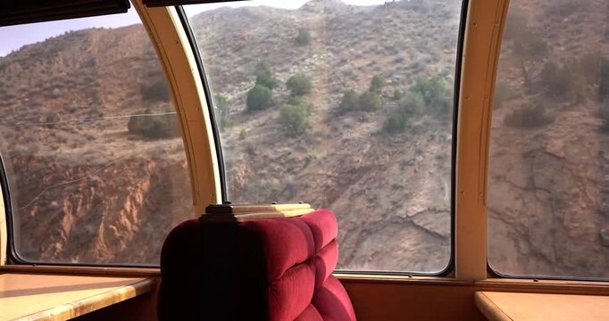 Interior of dining car on scenic railroad journey
