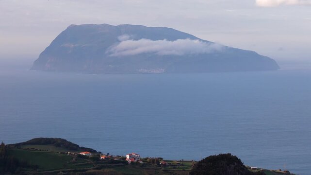 Corvo Island Seen From Flores Island in the Azores, Portugal. - aerial shot
