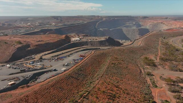 Australian Kalgoorlie KCGM Super Pit mine site aerial with a truck emerging from the pit