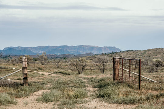 Old rustic farm gate with Flinders Ranges landscape