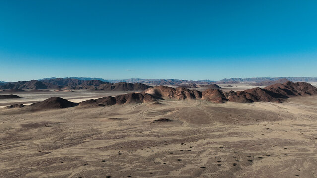 Views of Sossusvlei desert landscape under clear blue sky in Namibia