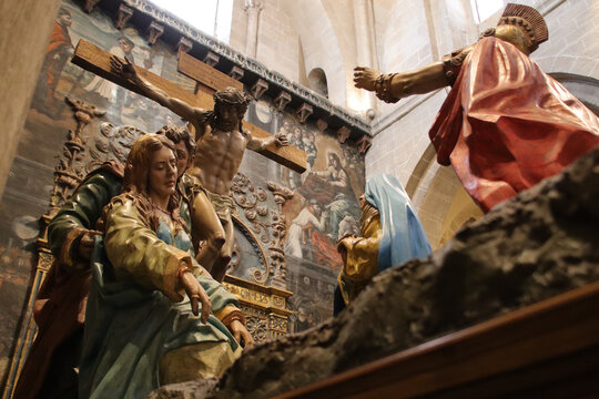baroque sculpted group of holy characters on a procession float in a gothic cathedral in zamora in spain 