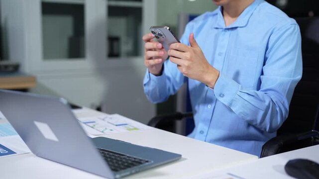 Hand using smart phone payments online shopping, omni channel, digital docking keyboard computer.