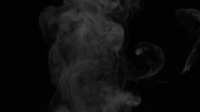 Real rising steam captured on black background with alpha channel. Ideal for coffee cups, hot drinks, food presentations, compositing and visual effects.