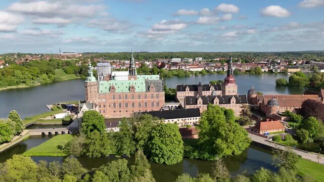 Flight over Frederiksborg Castle landmark, Hillerod, Denmark
