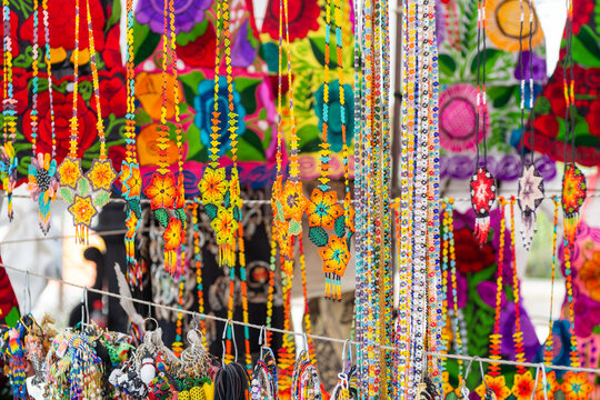 Colorful Handmade Huichol Beaded Necklaces with Floral and Star Patterns