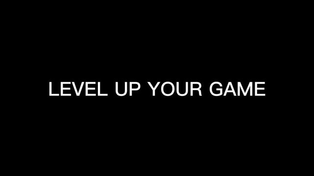 A motivational phrase on a black background with white text that reads level up your game