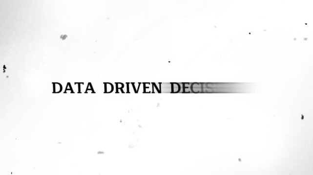 Blurry black text on white background with speckles