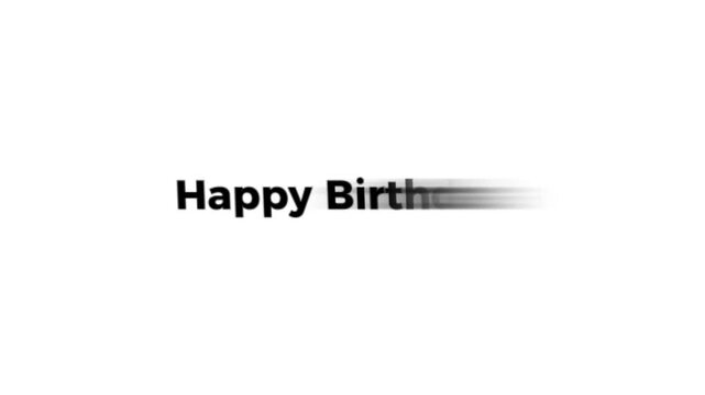 A blurry black happy birthday text on a white background