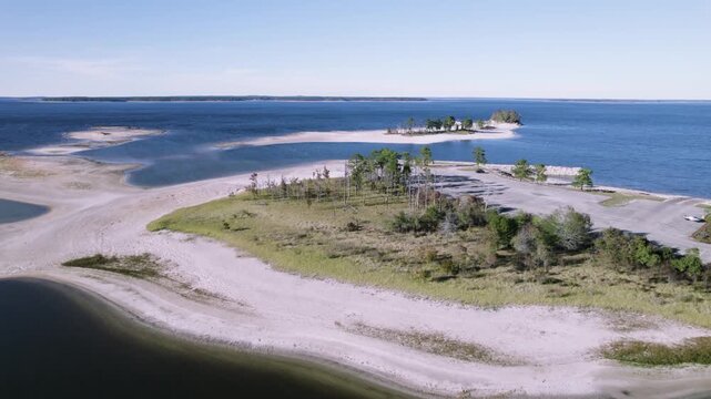 Aerial view of a beach and island near twin dikes park on Sam Rayburn Reservoir
