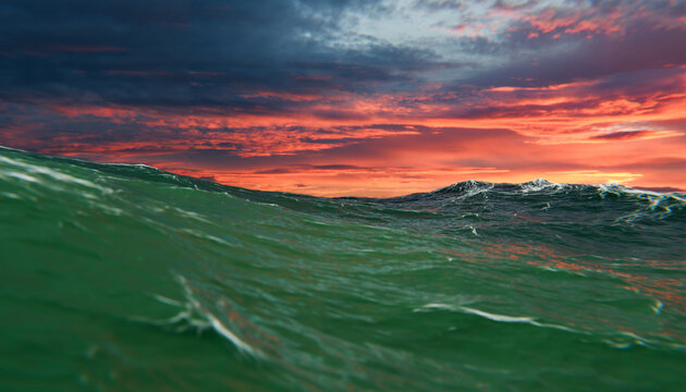 Vibrant waves under a dramatic sunset sky with hues of orange and dark clouds. Illustration, rendering