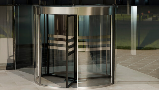 Modern glass and metal revolving door entrance to a building during daytime. Illustration, rendering