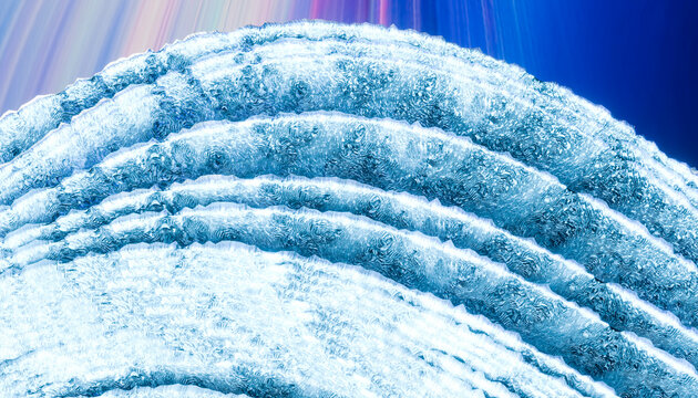 Abstract view of ice or crystal layers with a vibrant blue and white pattern.