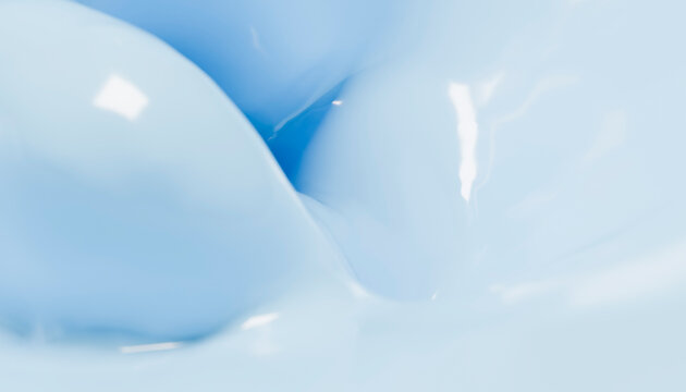 Close-up of a swirling soft blue liquid with reflective highlights.