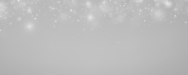 White dust sparkles drift slowly in dark space. Gentle glow builds elegant abstract depth. Ideal texture PNG © Extrastock