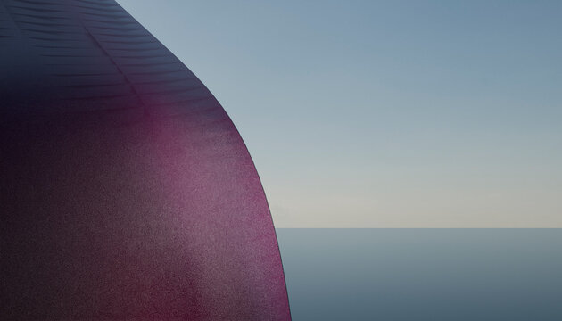 A curved, metallic purple structure against a blue sky and horizon.