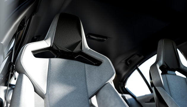 Modern car interior with sleek black and gray sport seats and futuristic design elements.