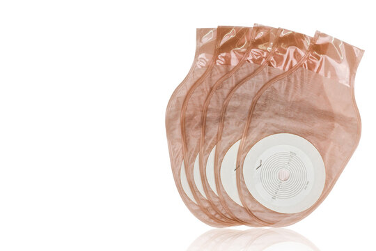 One piece drainable ileostomy or colostomy pouch products isolated on white background. Five pouch stoma care products on white background. Ostomy bag for colon or rectal cancer patients. Stoma care.