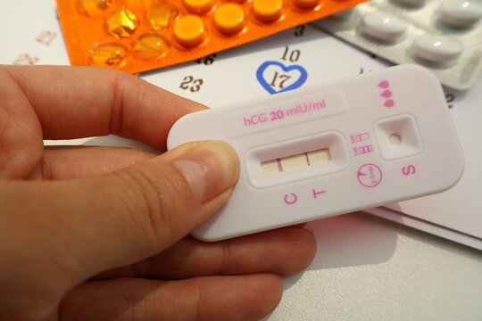 Birth control pills for women and pregnancy test, conception date on the calendar, due date, ovulation day, fetus, pregnancy, birth control and fertility increase.