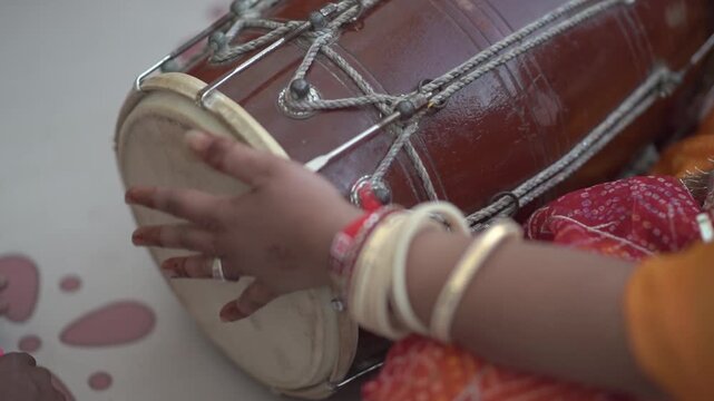 Dhol Playing in Function with Traditional Indian Drum Performance, Wedding Celebration, Festive Energy, and Cultural Music Atmosphere