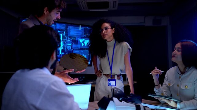 Software engineer discussing advanced virtual reality technology and digital product development in futuristic innovation laboratory workspace