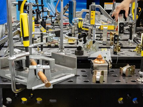 Industrial Welding Clamps, Vises and Modular Fixtures Mounted on a Precision 3D Welding Table