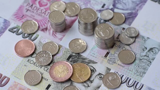 Czech paper money, koruna or crown, in various denominations for financial exchange and settlements. Czech koruna as a financial background for your design