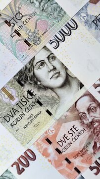 Czech paper money, koruna or crown, in various denominations for financial exchange and settlements. Czech koruna as a financial background for your design