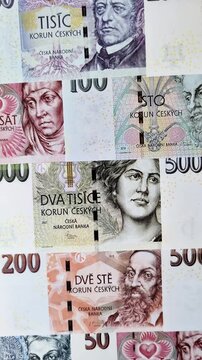 Czech paper money, koruna or crown, in various denominations for financial exchange and settlements. Czech koruna as a financial background for your design