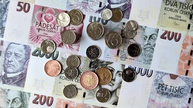 Czech paper money, koruna or crown, in various denominations for financial exchange and settlements. Czech koruna as a financial background for your design
