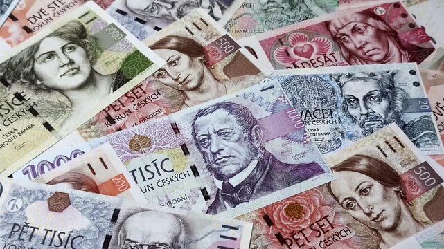 Czech paper money, koruna or crown, in various denominations for financial exchange and settlements. Czech koruna as a financial background for your design