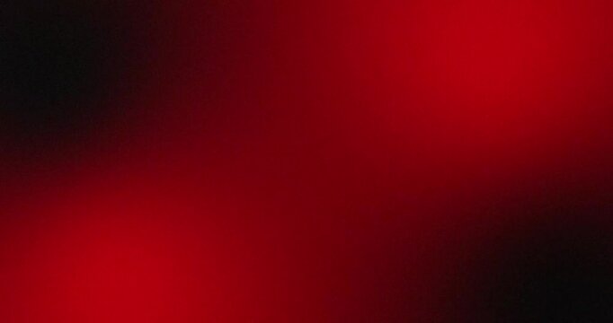 Liquify effect dark red black abstract grain background video. Smooth gradient blend with shimmer noise texture, glowing crimson highlights, and subtle motion. Clean minimalist 4K backdrop loop