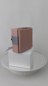 Vertical 4K Premium Ribbon Pink and Bronze Gift Box Showcase Clockwise