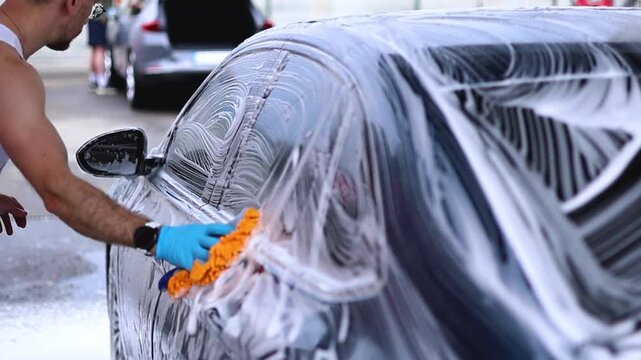 The process of washing a car at a car wash