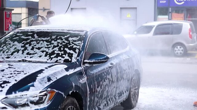 The process of washing a car at a car wash