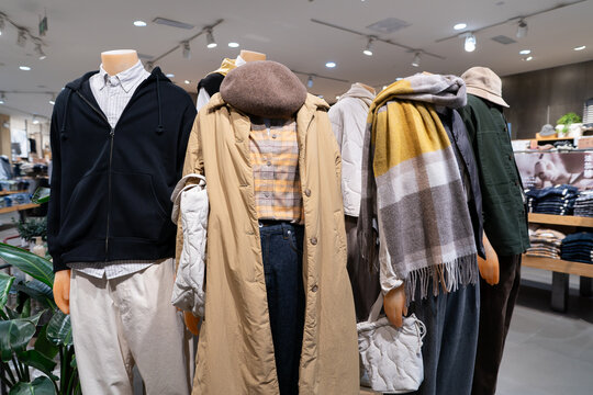 Dressed mannequins inside Muji store at iN City Park