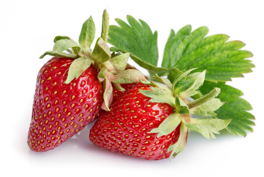Fresh berry strawberry with green leaf. Fruity still life healthy food. Isolated on white background.