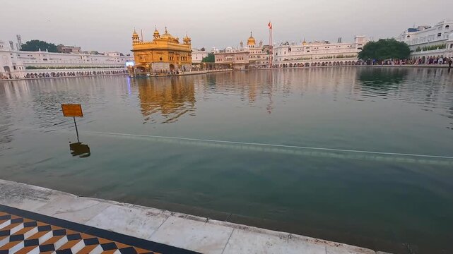 Golden Temple (Sri Harmandir Sahib) Reflected in Sacred Sarovar at Amritsar, Punjab, India