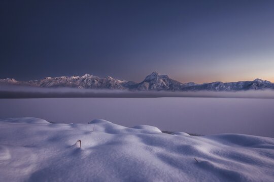 Shortly after sunset, twilight at Lake Hopfensee in the Allg&auml;u in Bavaria in a winter landscape, Germany