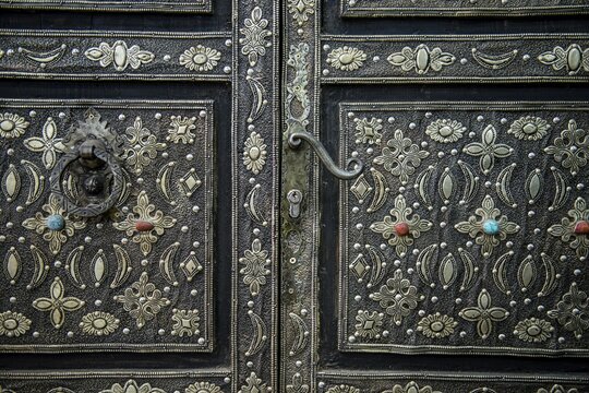Artfully decorated door with silver and semiprecious stones, Ouarzazate, Dr&acirc;a-Tafilalet, Atlas Mountains, Morocco