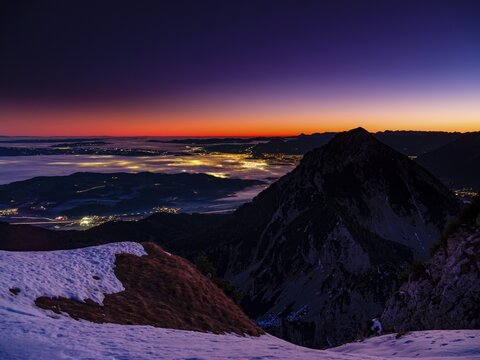 Dawn in the mountains, view of Salzburg with fog, Hochstaufen, Zwiesel, Bad Reichenhall, Berchtesgadener Land, Upper Bavaria, Bavaria, Germany